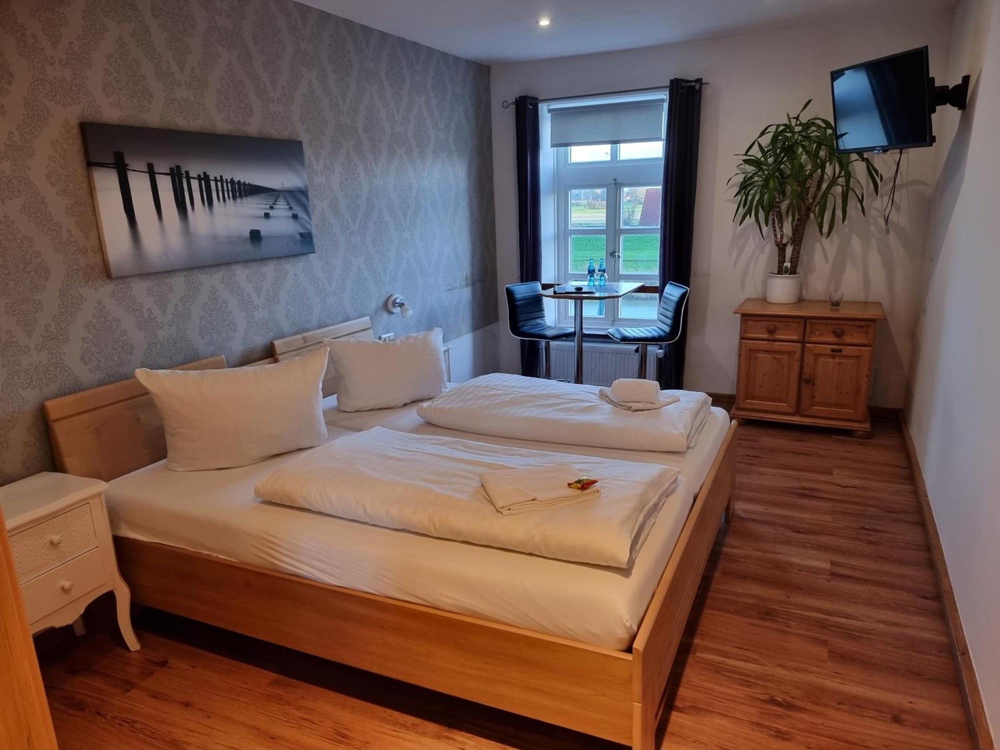 Hotel Packhaus Hooksiel Chambre photo